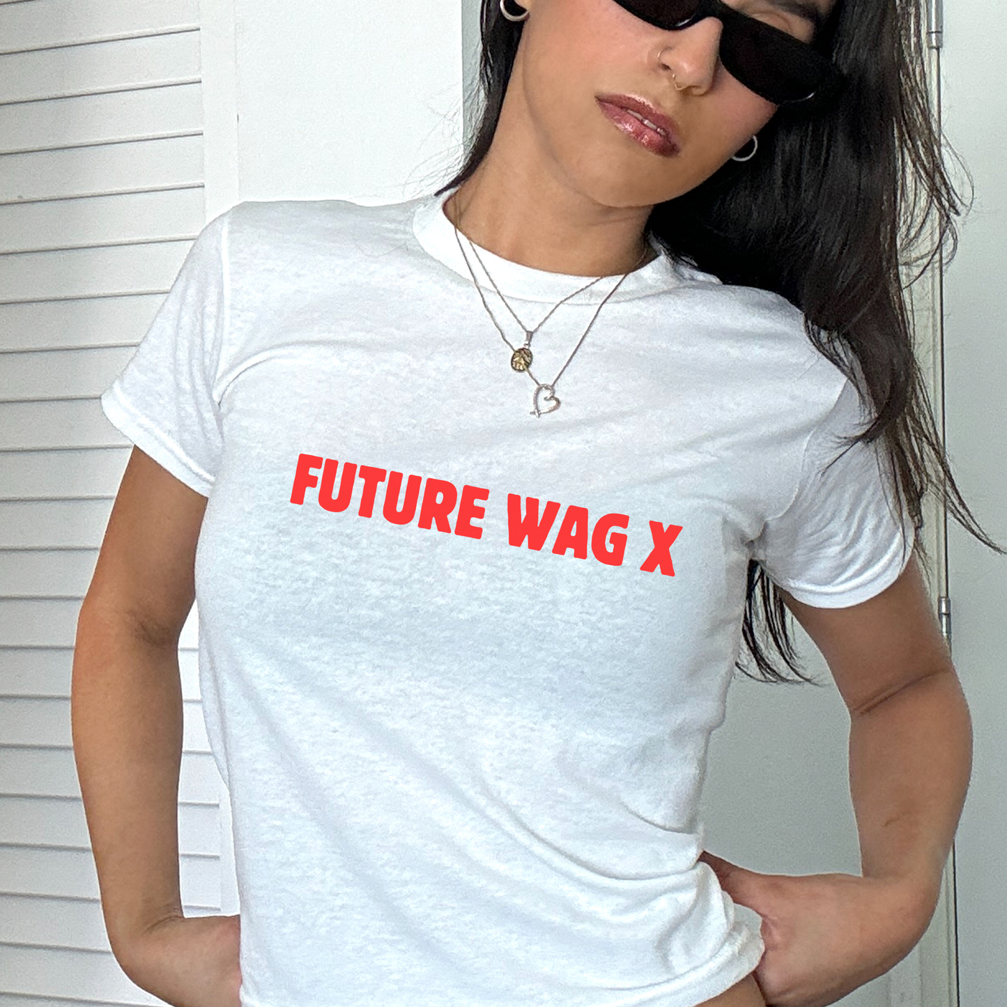 White baby tee with red “Future WAG x” slogan, funny football fan shirt for women