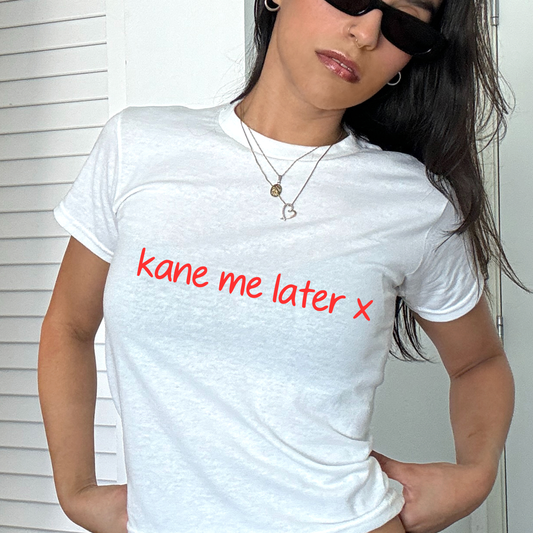 White baby tee with red “Kane me later x” slogan, funny England football fan shirt for match day